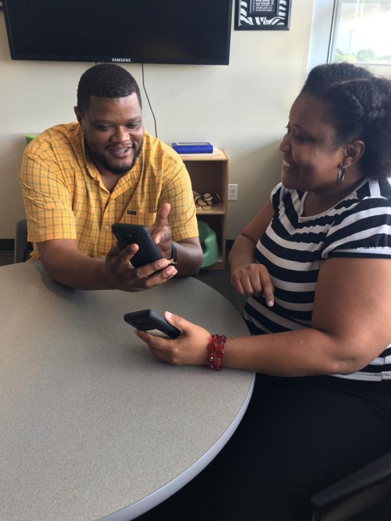 durham-dss-staff-cindy-walters-thomas-williams-checking-out-the-new-mobile-ap