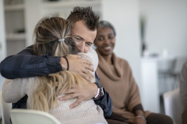 Hugging-in-therapy-medium